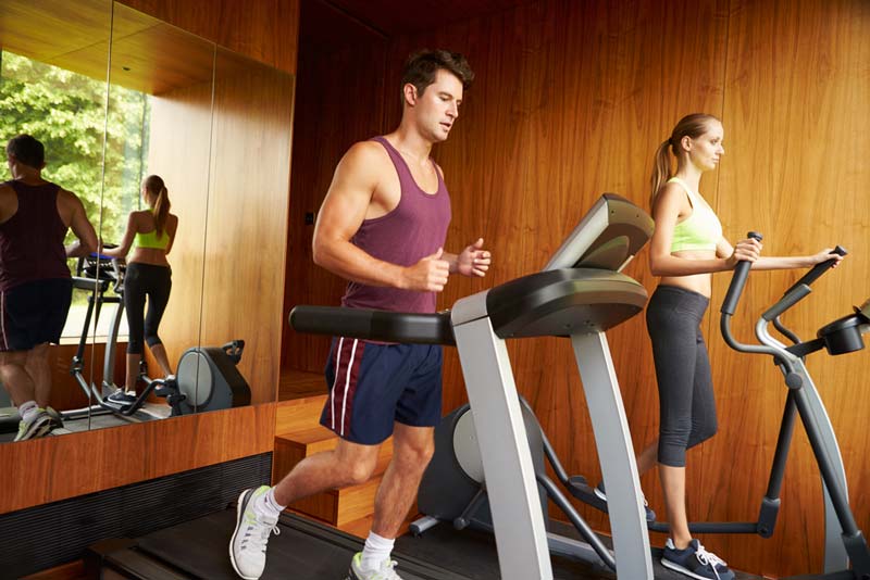 Exercising Together In Home Gym — Treadmill Hire and Sales in Kewarra Beach, QLD Exercising Together In Home Gym — Treadmill Hire and Sales in Kewarra Beach, QLD